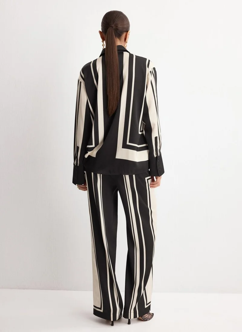 مانجو Satin printed trousers